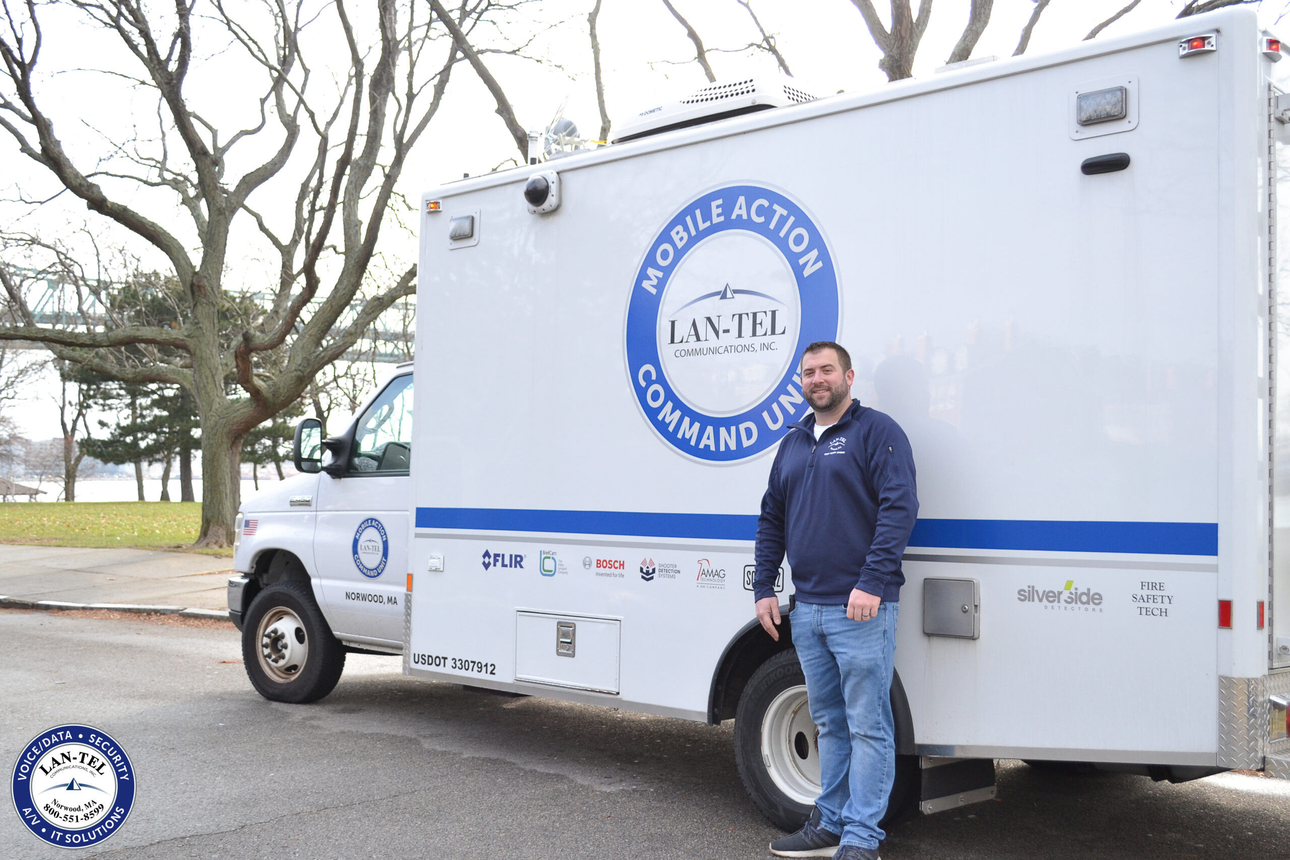 Scott standing with Mobile Command Unit